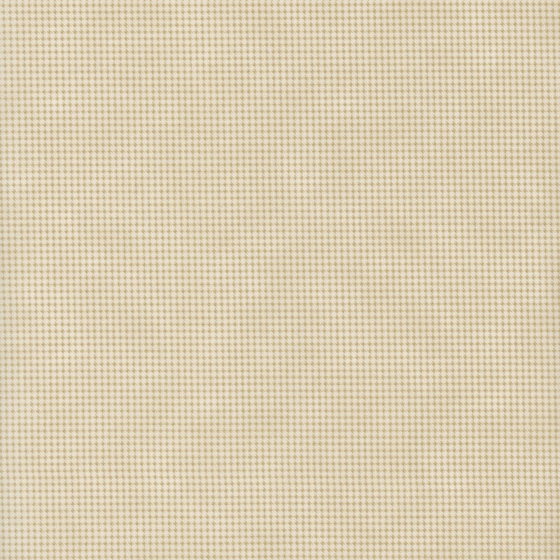 Mottled beige fabric with a small, repeating, dotted texture throughout
