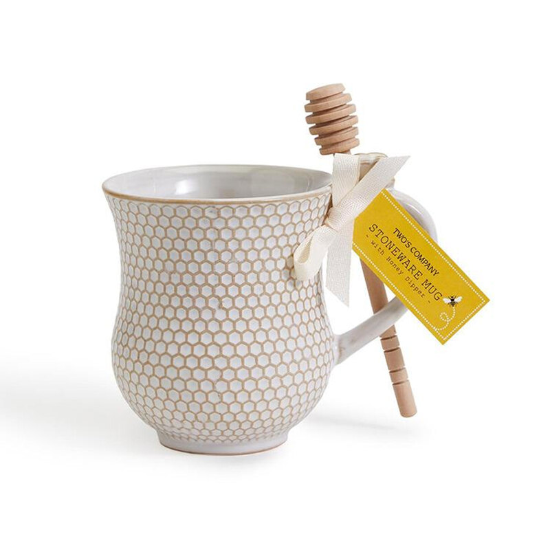 photo of honeycomb mug with dipper on a white background