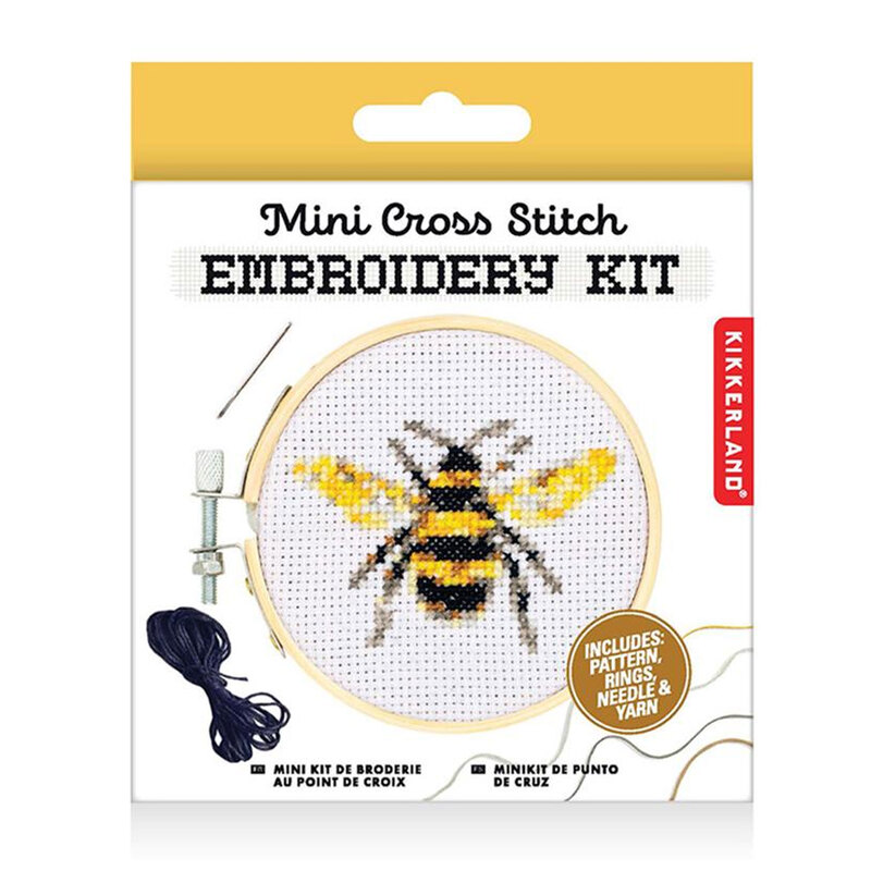 photo of the cross stitch kit packaging showing the completed design on a white background