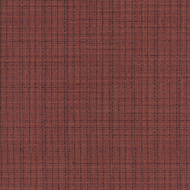 Scan of the woven fabric, a textured maroon small plaid on a schoolhouse red background.