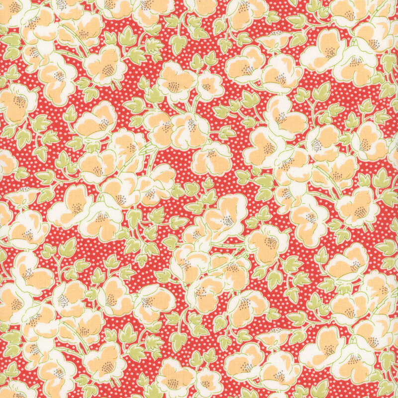 Red fabric with tossed apricot orange snap pea flowers, lime green leaves, and packed peach polka dots.