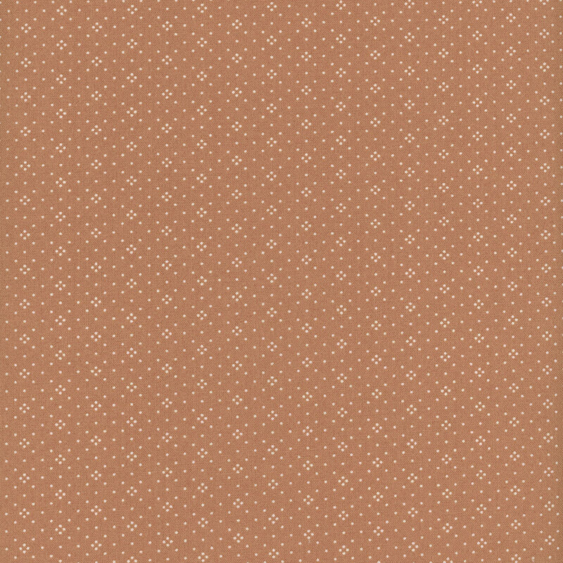 Bright chocolate brown fabric with a repeating geometric dotted pattern.