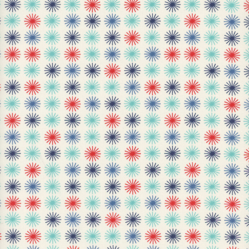 Off white fabric with red, aqua, and navy blue circular star bursts spaced evenly throughout