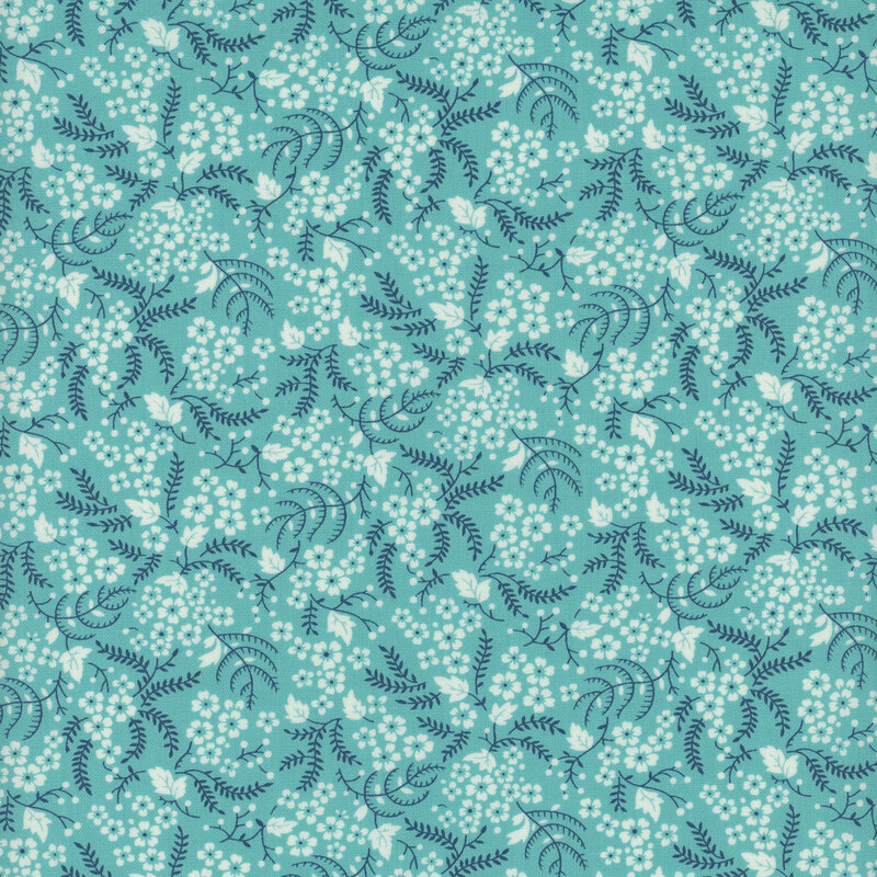 Bright aqua fabric with clusters of small white flowers and dark navy blue leaves and vines
