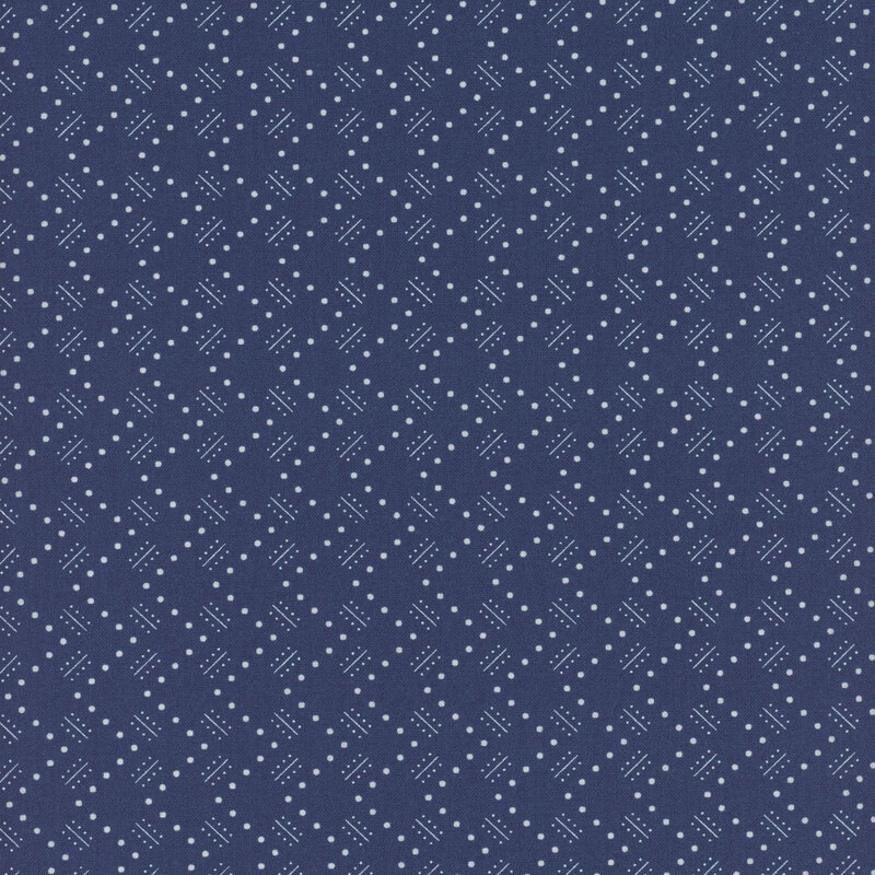 Dark navy blue fabric with white dotted zig-zags and geometric shapes throughout