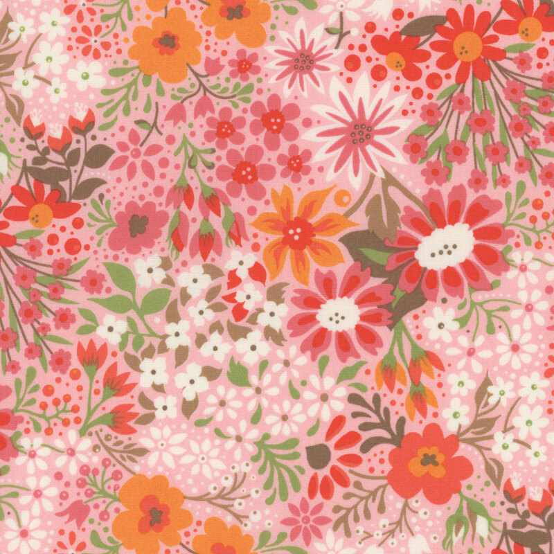 Light pink fabric featuring various multicolored florals