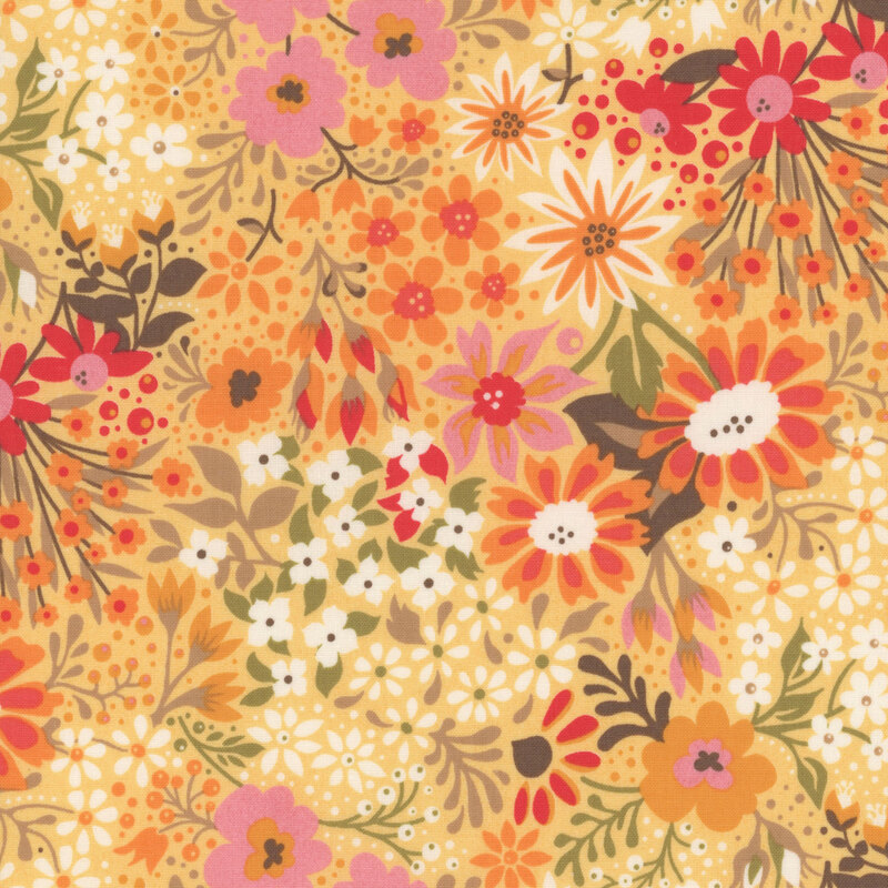 Golden yellow fabric featuring various multicolored florals
