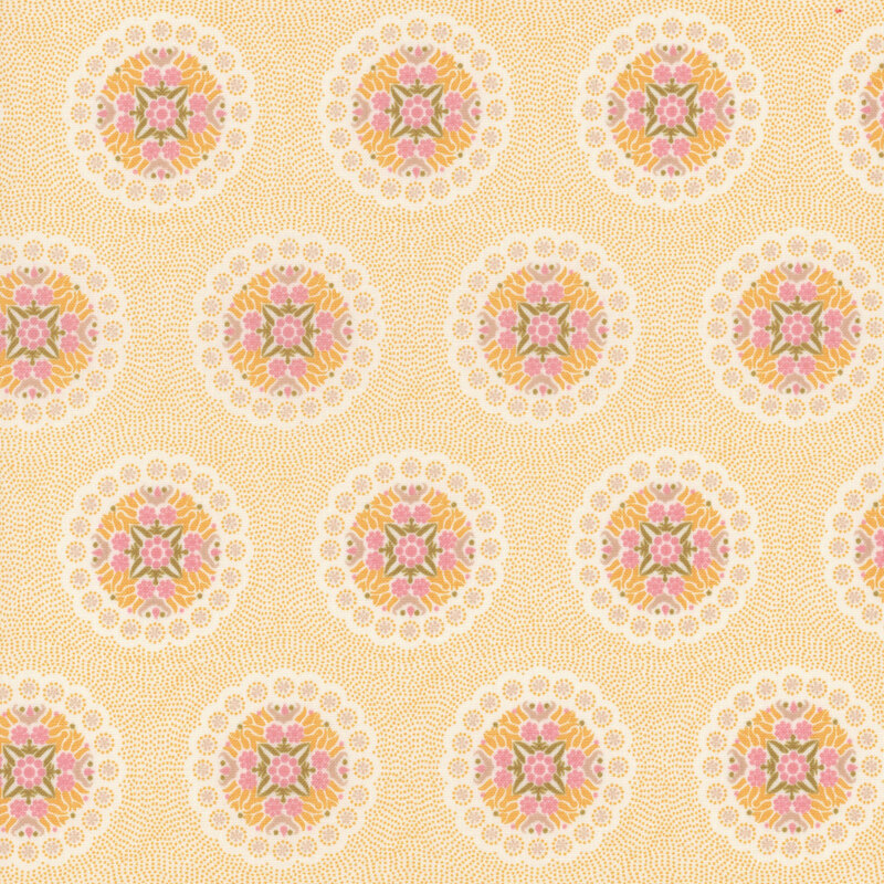 Cream fabric with many small yellow dots featuring a geometric design of florals