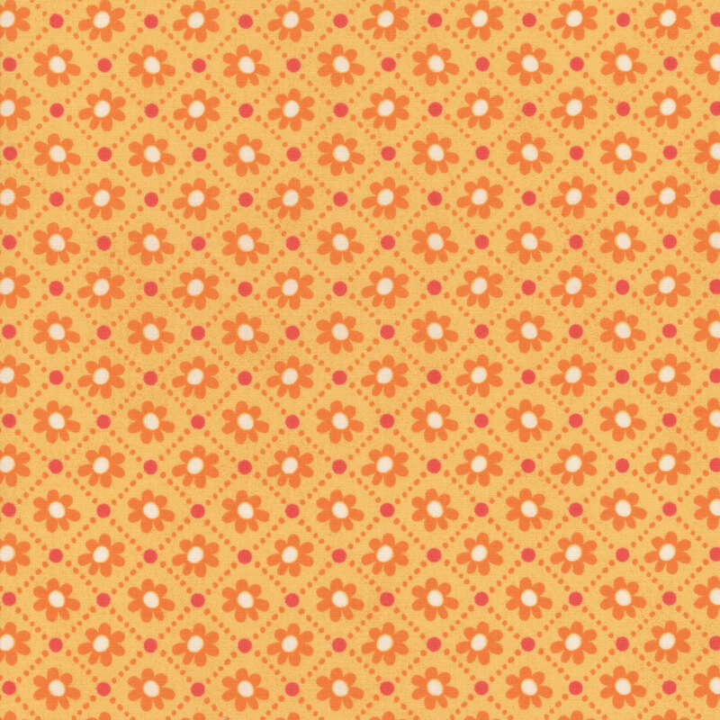 Golden yellow fabric featuring a dotted checkerboard design with orange and white florals