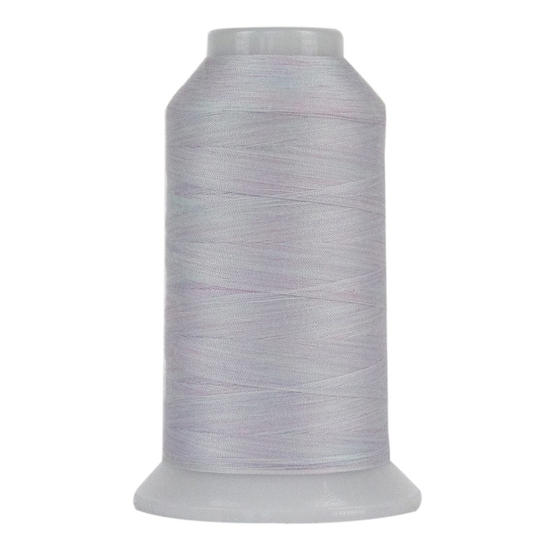 Silvery pink spool of variegated thread, isolated on a white background.
