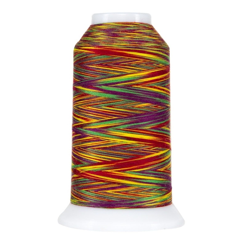 Vibrant and multicolored spool of variegated thread, isolated on a white background.