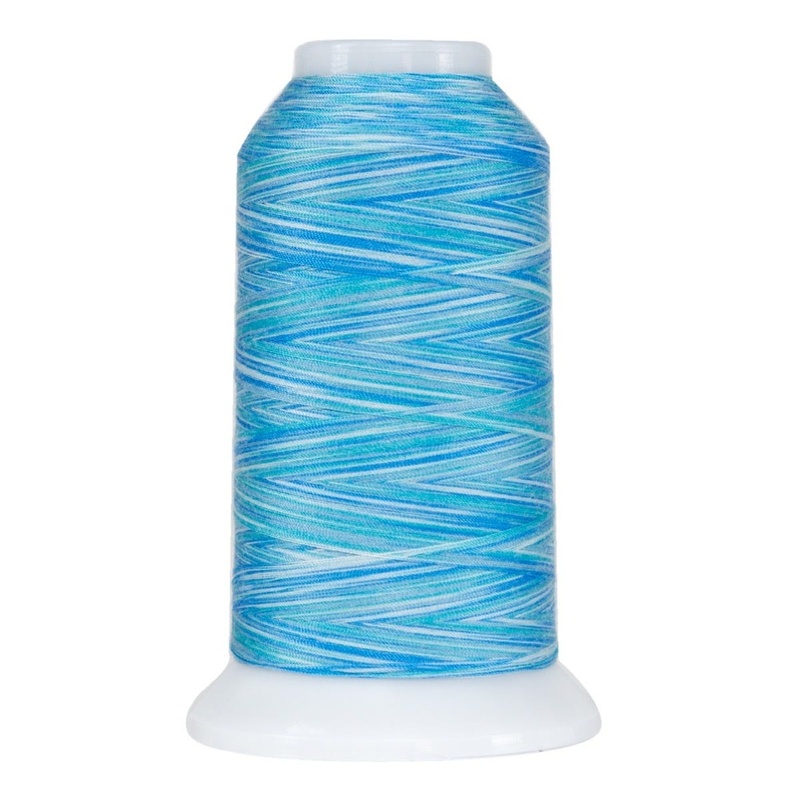 Bright cyan blue spool of variegated thread, isolated on a white background.