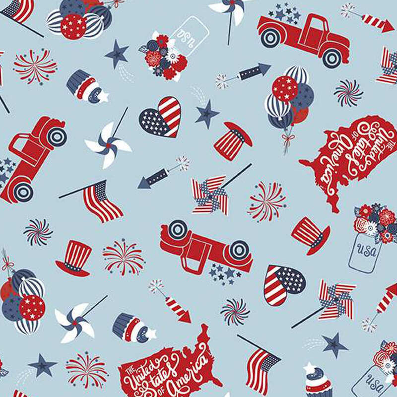 light blue fabric with tossed trucks, american flags, hearts with american flag designs, pinwheels, and other patriotic motifs