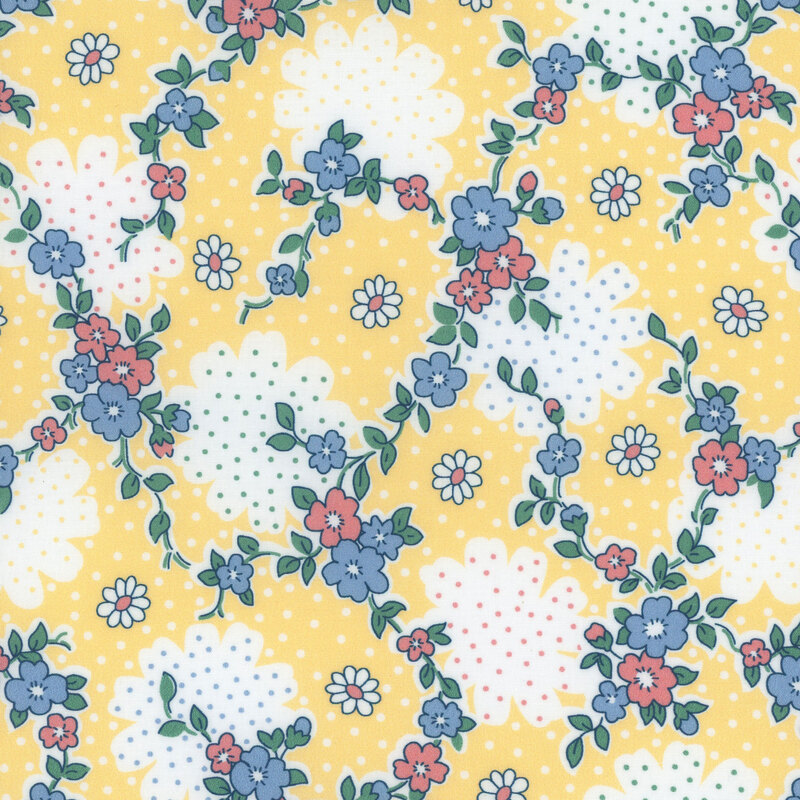 Bright yellow fabric with large white floral outlines and vines with blue and red flowers throughout