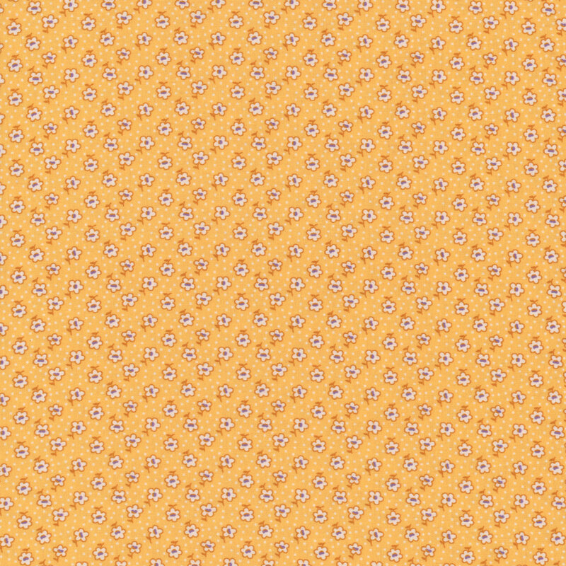 Golden yellow fabric with small, white, ditsy flowers and tiny white dots throughout
