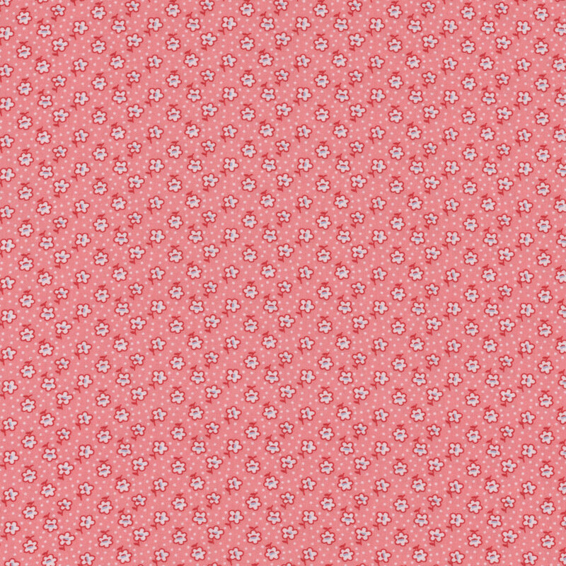 Pink fabric with small, white, ditsy flowers and tiny white dots throughout