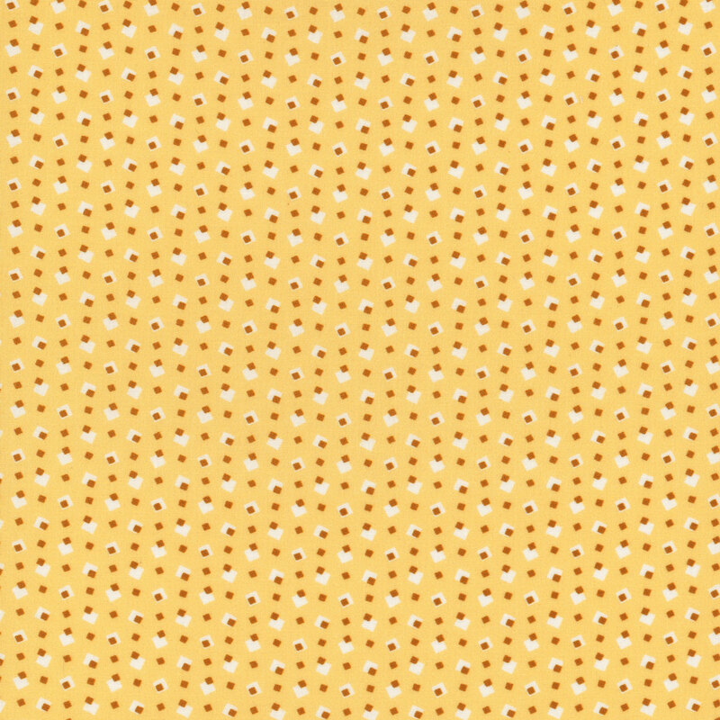 Golden yellow fabric with small white and dark yellow squares evenly spaced all over
