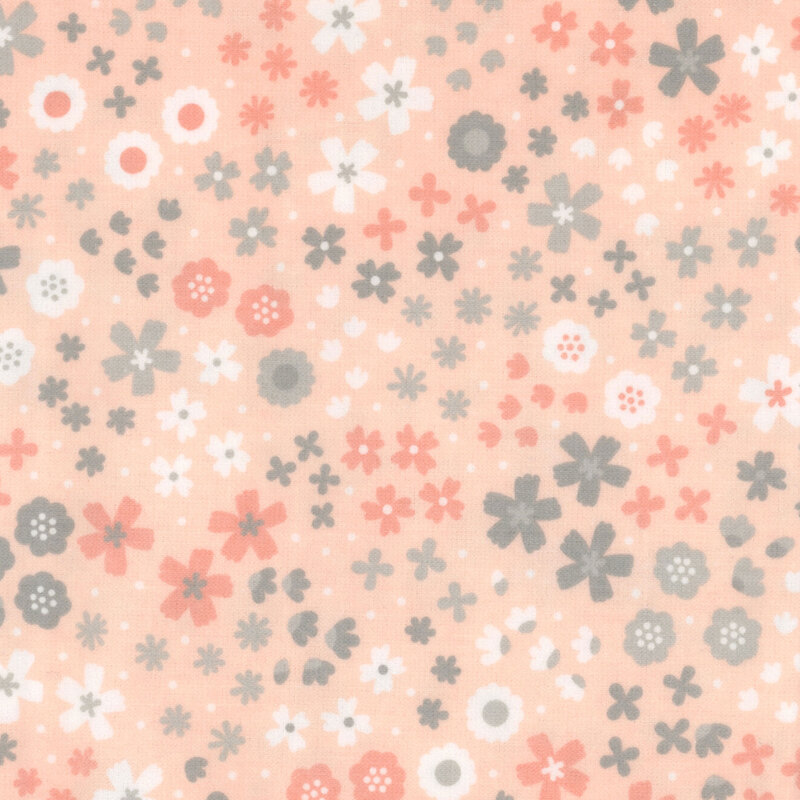 Pastel peach fabric featuring florals