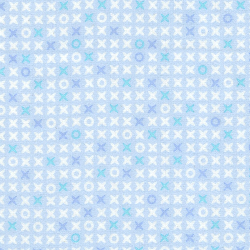 Pastel blue fabric scattered with x's and o's