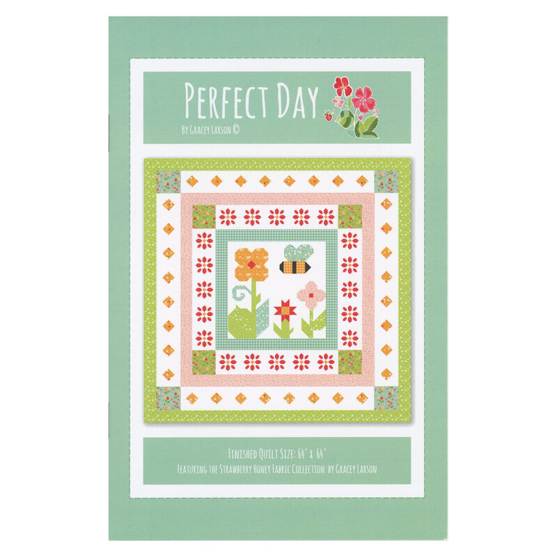 Front cover of the pattern showing a digital mockup of the completed Perfect Day quilt in bright cheerful colors on an aqua background.