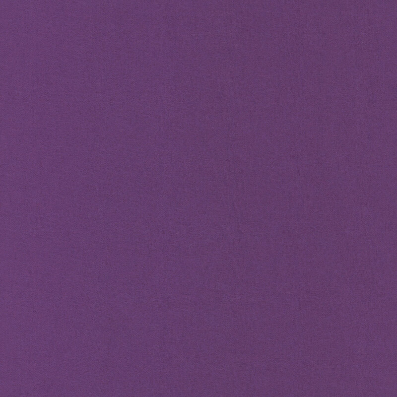Eggplant purple flannel fabric with slightly visible flannel texturing.