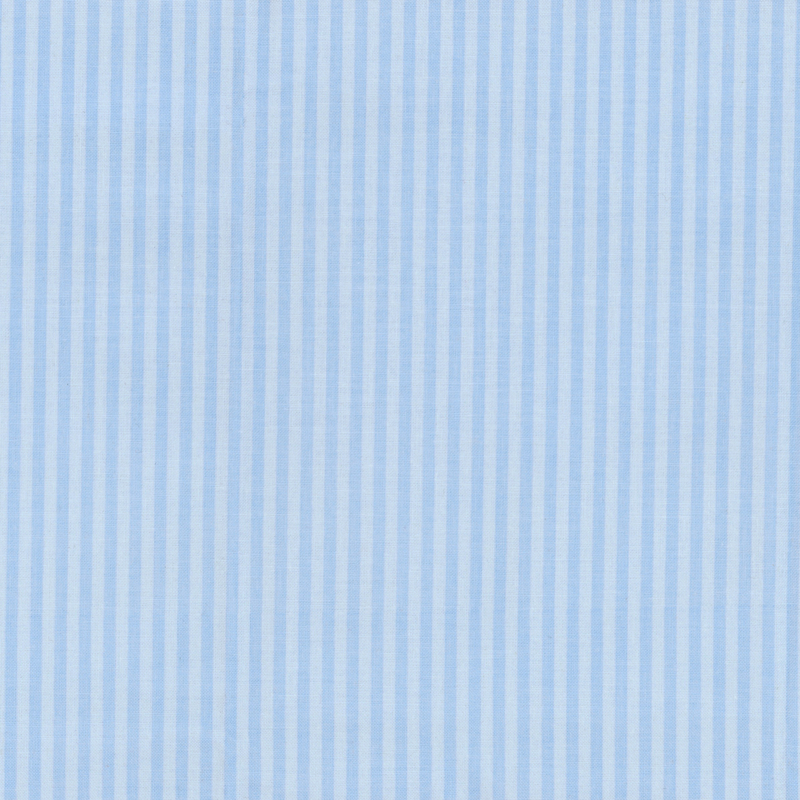 Tonal light blue striped fabric with alternating dark and light stripes