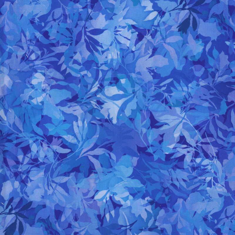 Medium blue tonal fabric with various foliage, leaves, and vines throughout