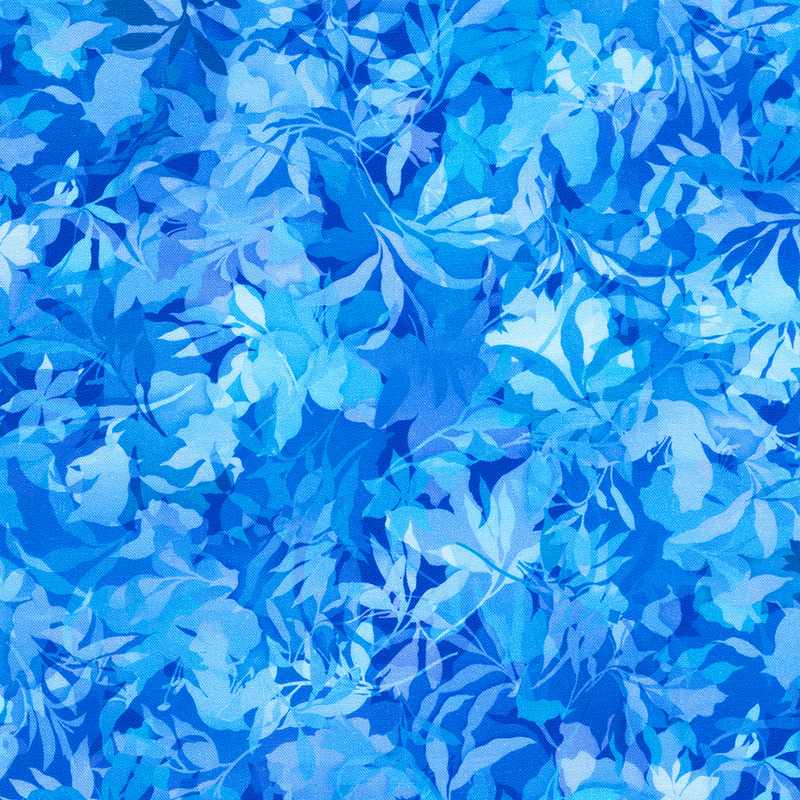 Medium blue tonal fabric with various foliage, leaves, and vines throughout