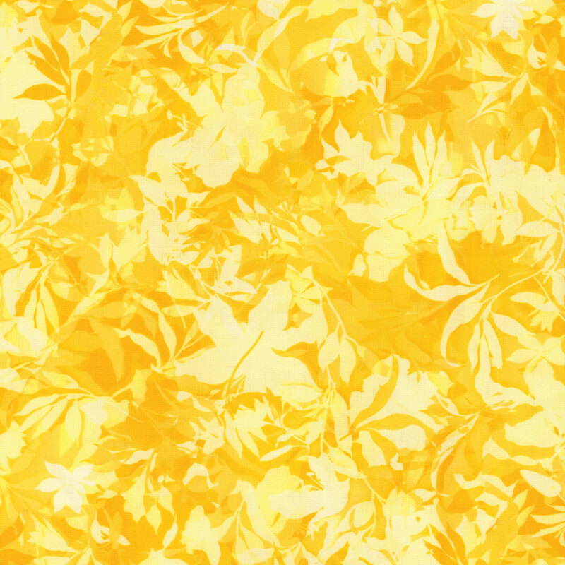 Bright yellow fabric with various foliage, leaves, and vines throughout