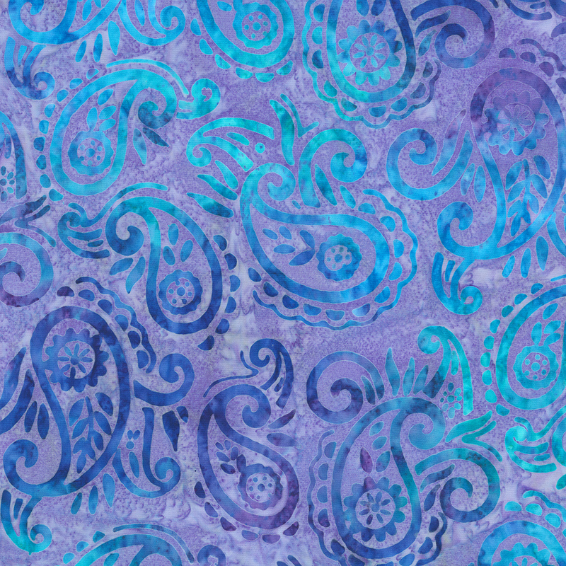 Mottled purple batik fabric with dark blue and sky blue paisleys and scrolls