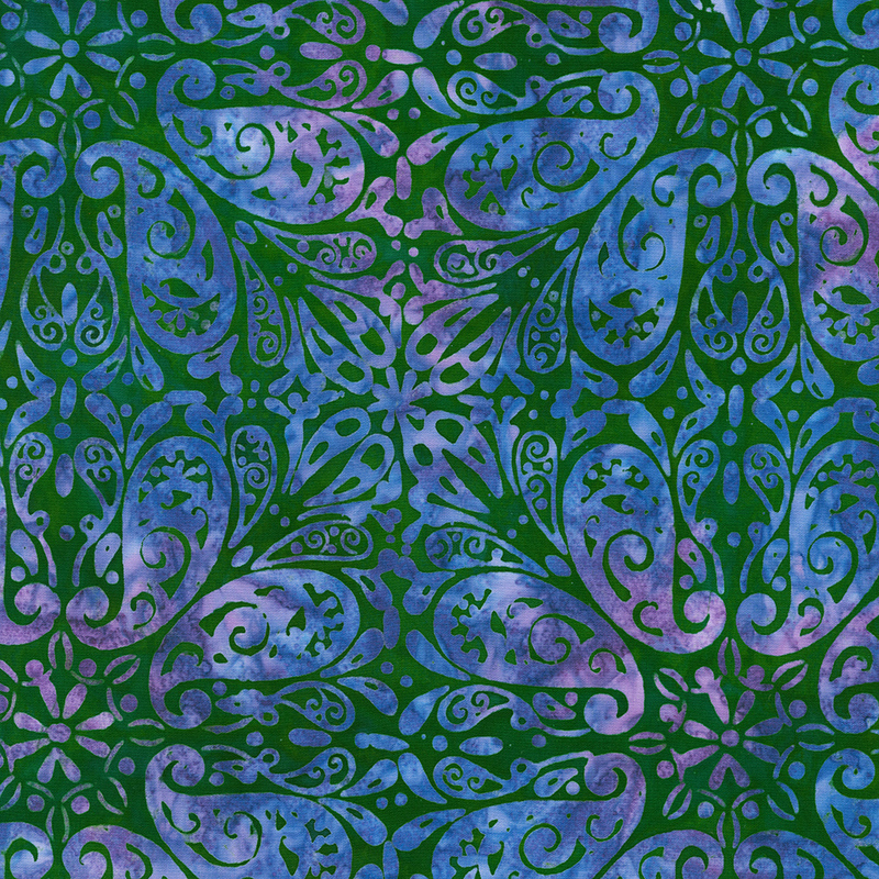 Dark green mottled batik with blue purple paisleys arranged in a repeated pattern