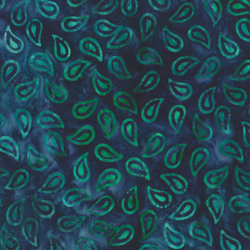 Dark blue mottled batik fabric with green ditsy paisleys