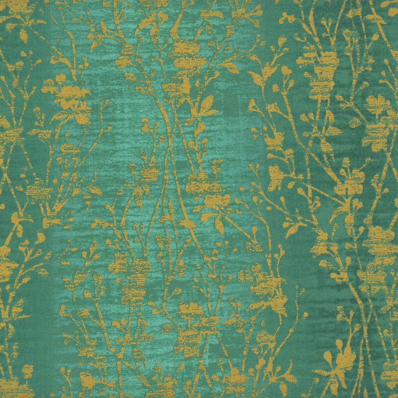 mottled teal fabric with metallic gold branches stretching across the fabric and distressed vertical lines running through the print