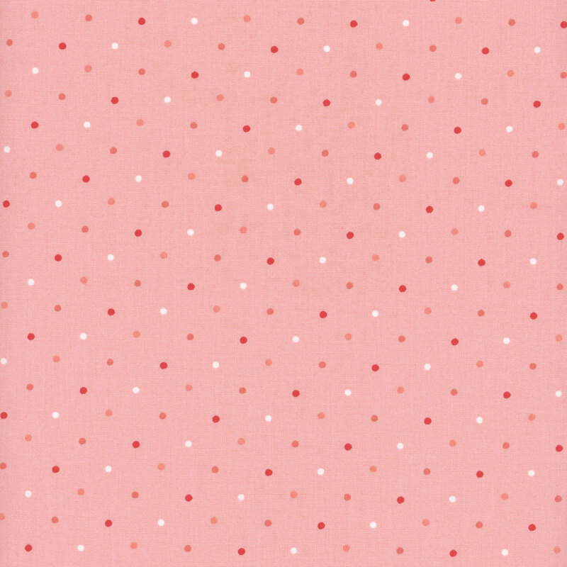 Light pink fabric with alternating red, pink, and white polka dots.