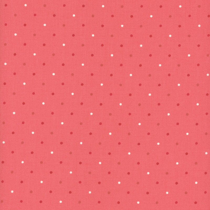 Medium pink fabric with alternating red, pink, and white polka dots.