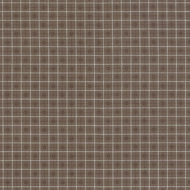 gray fabric with a white and dark gray overlapping grid pattern