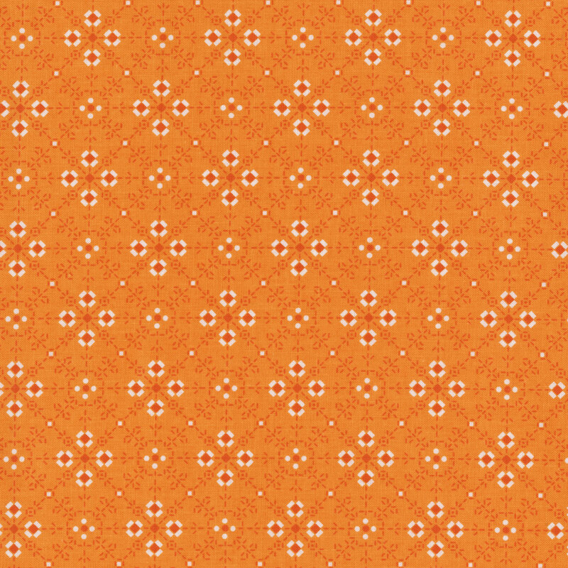 orange fabric with a latticed and geometric flower-like design