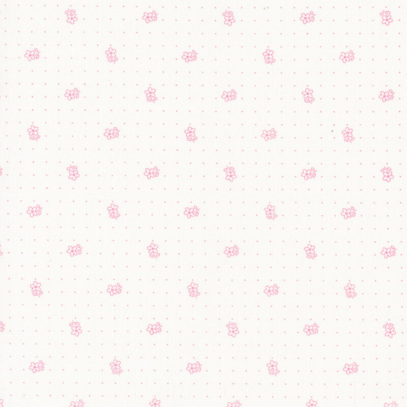 White fabric with tossed pink outlined daisies and rows of pink polka dots.