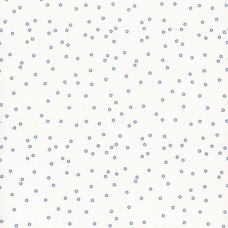 White fabric with scattered blue circle dots.