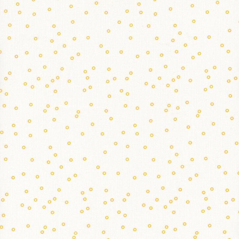 White fabric with scattered honey circle dots.