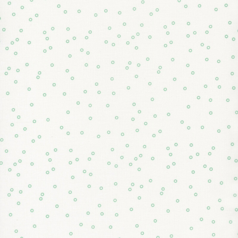 White fabric with scattered light teal circle dots.