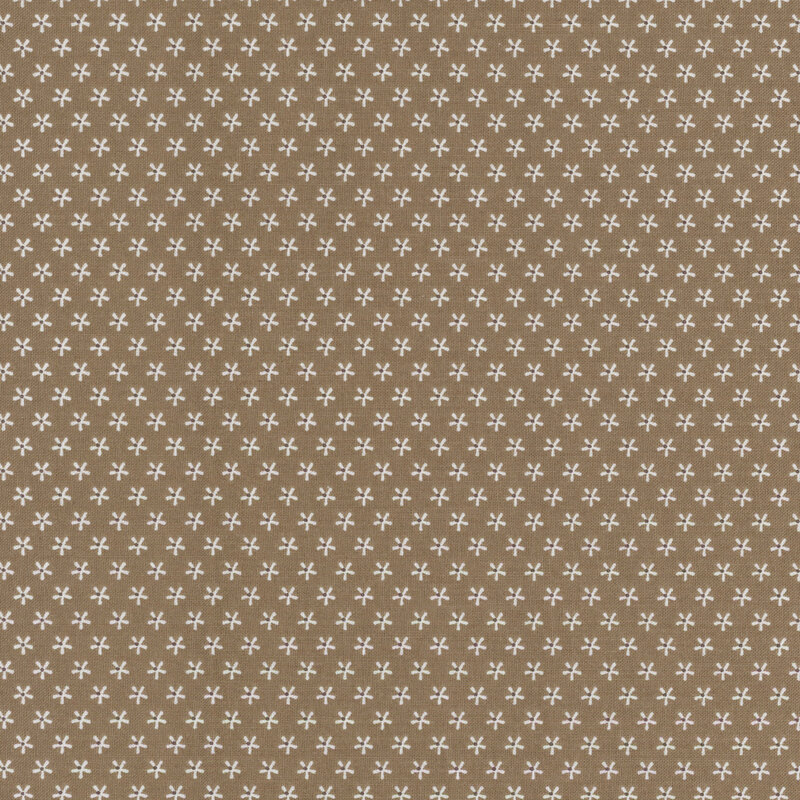 light brown fabric with rows of small flowers
