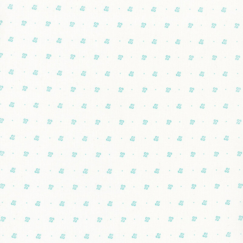 White fabric with rows of light blue clovers and pin dots.