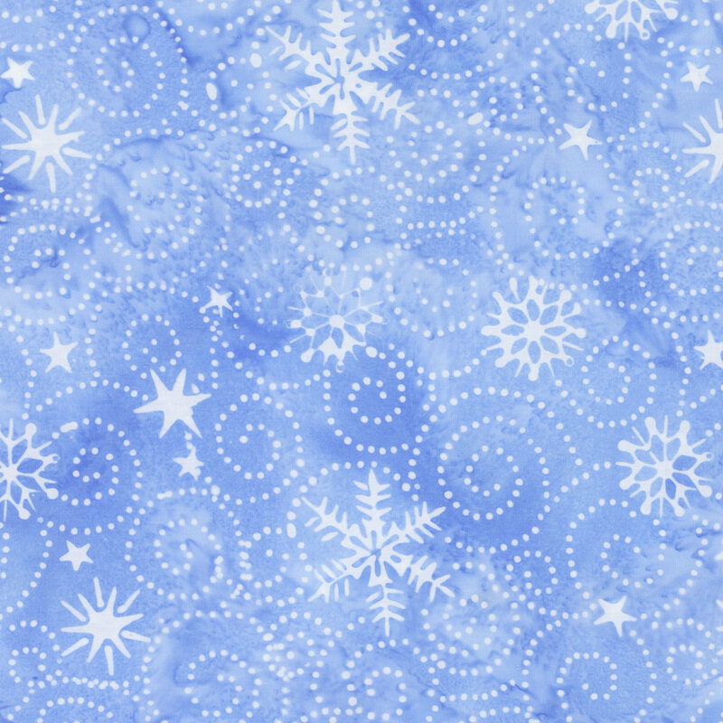 Light blue mottled batik fabric with white snowflakes and dotted swirl accents