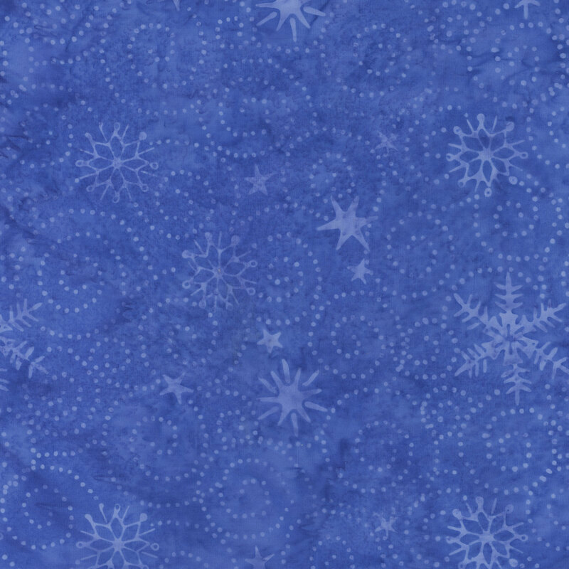 Medium blue tonal batik with lighter blue stars, snowflakes, and dotted swirls throughout