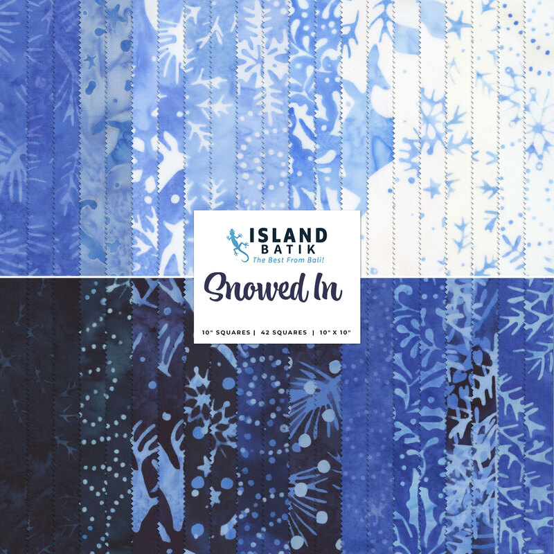 A stacked collage of blue and white mottled batik fabrics with winter motifs
