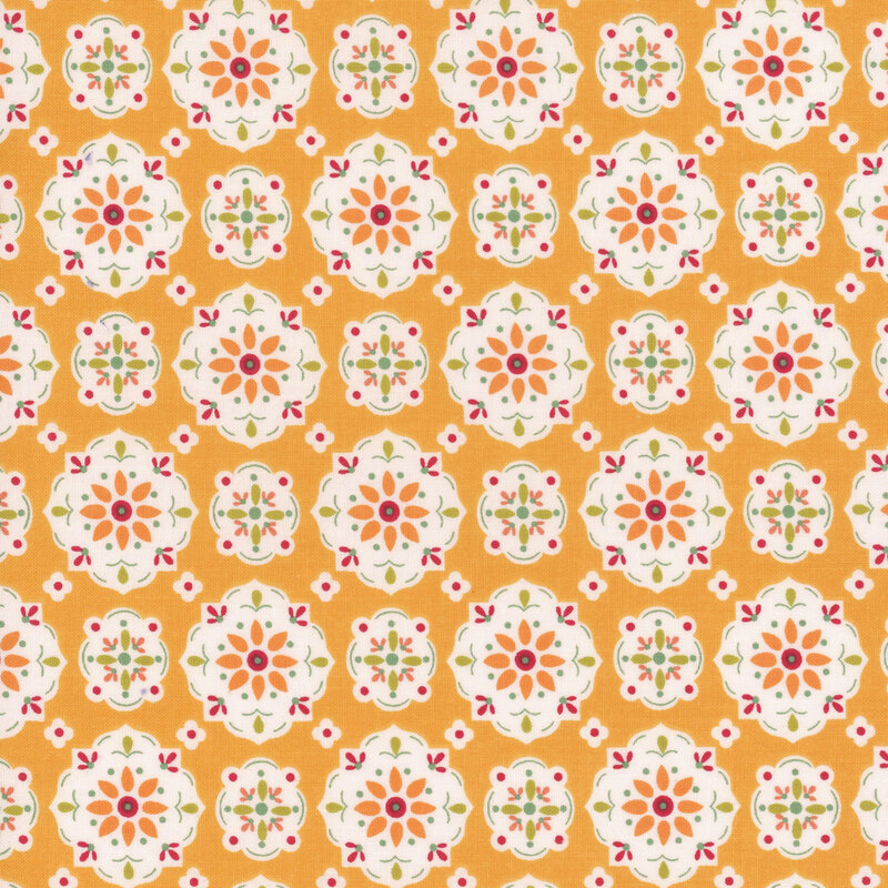 Marigold fabric featuring a geometric medallion floral design