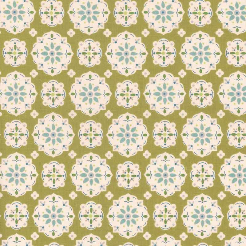 Olive green fabric featuring a geometric medallion floral design