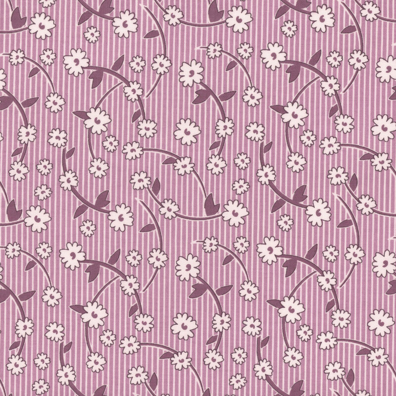 Purple and white striped fabric featuring leafy sprigs and white flowers
