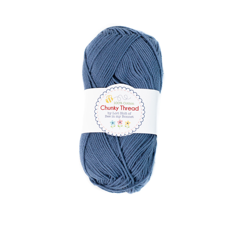 A skein of the Denim Chunky Thread, isolated on a white background.